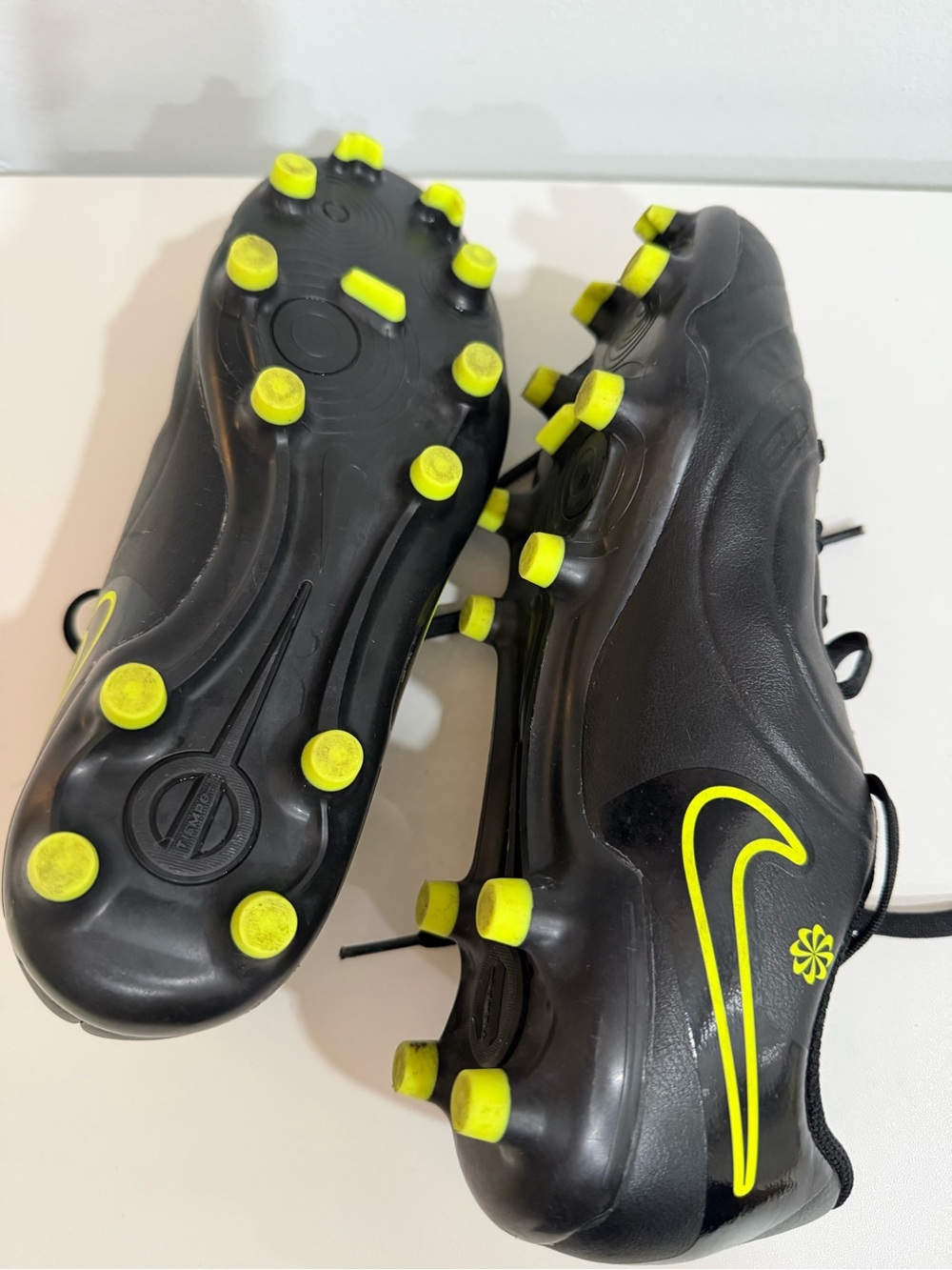 Nike Black Soccer Cleats with Neon Yellow Accents